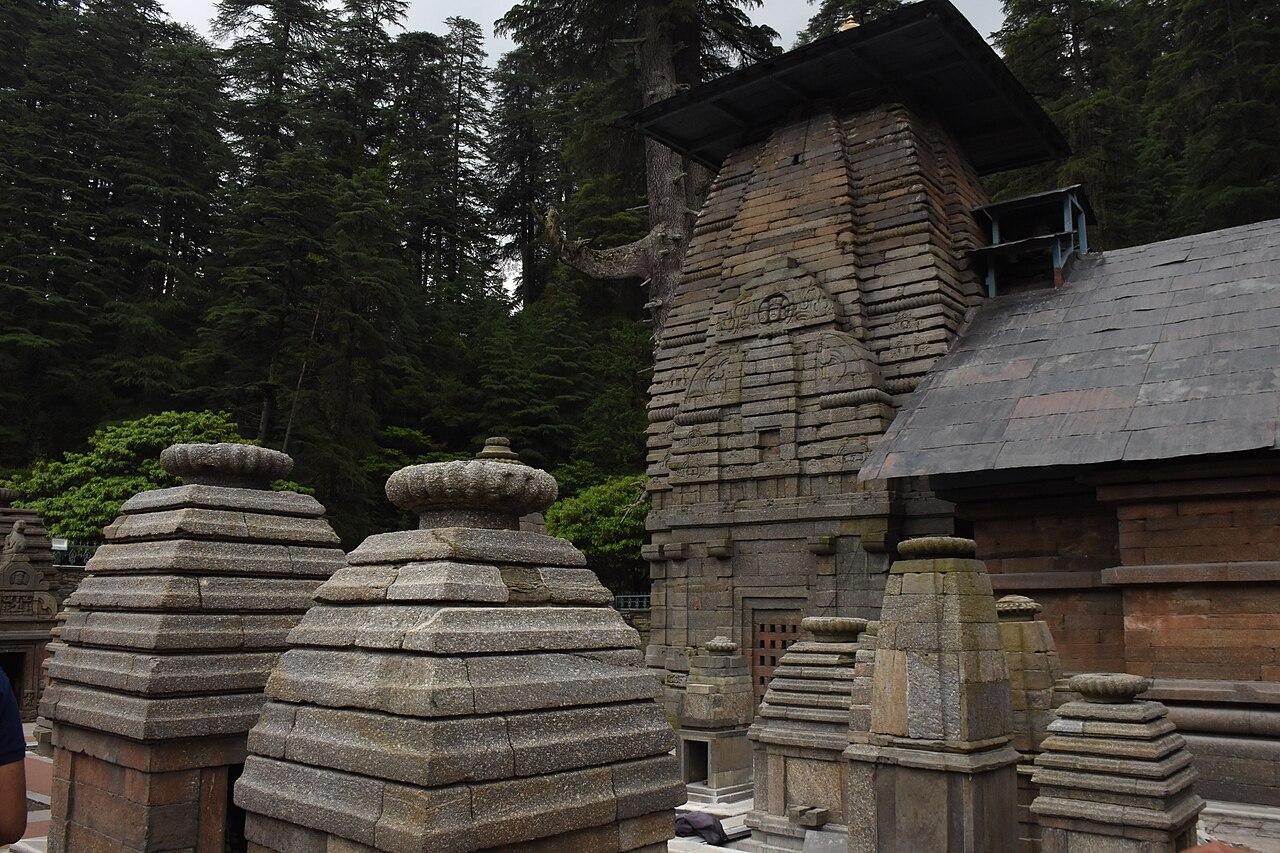 Ancient stone shrines at Jageshwar Dham surrounded by deodar forest