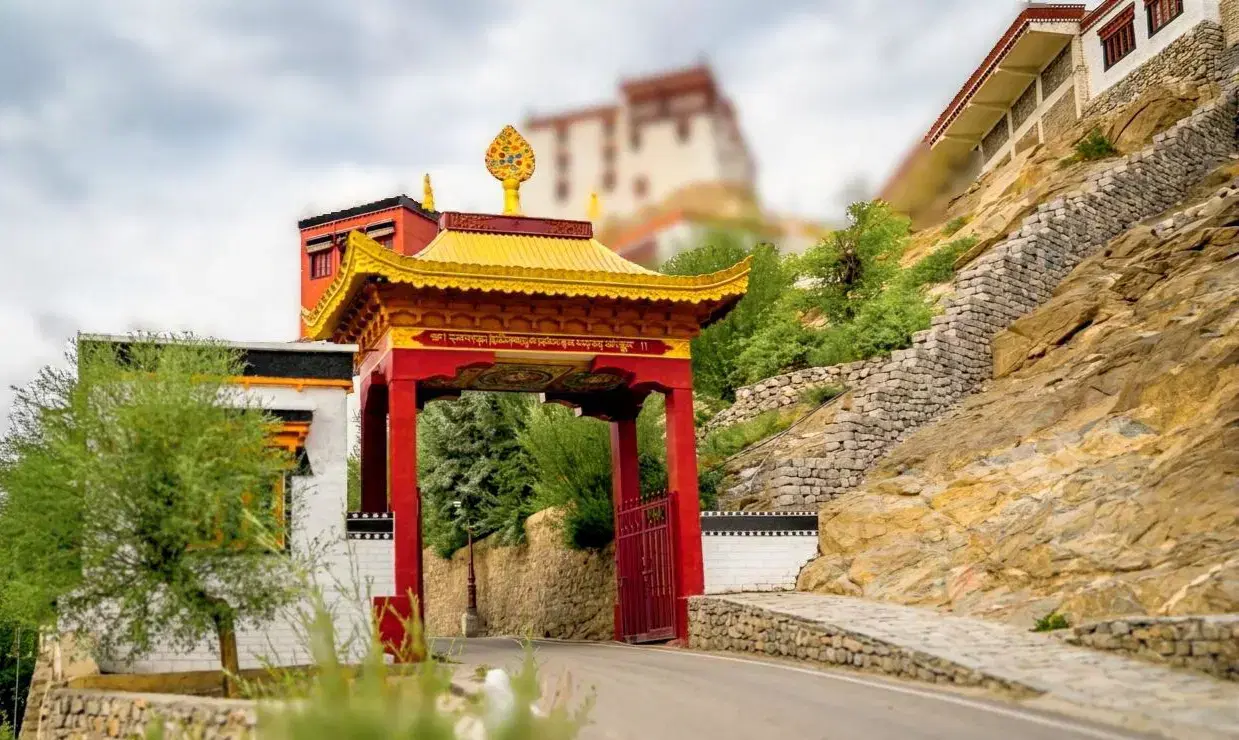 Thiksey Monastery's 12-story white structure on a steep hill with the 15-meter Maitreya Buddha statue, 20 km from Leh