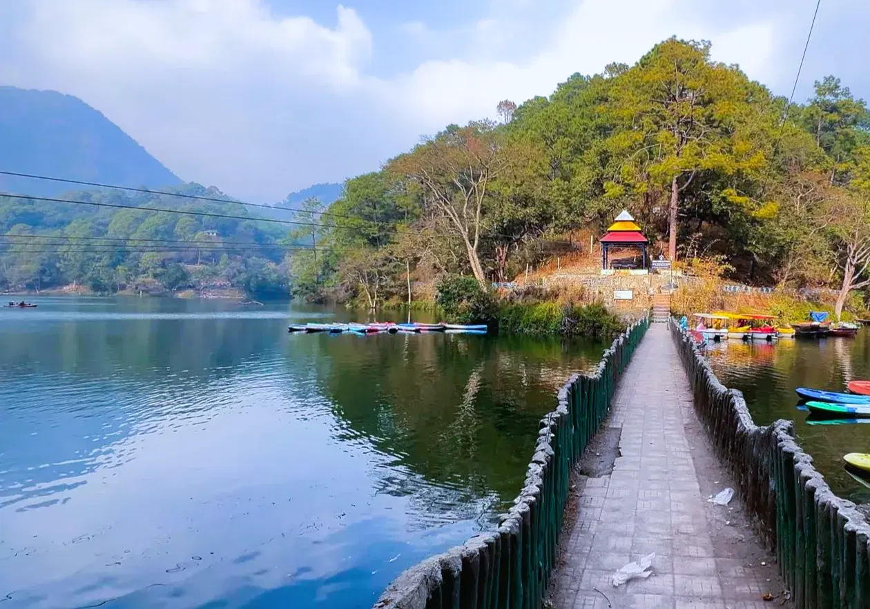 Clear interconnected lakes of Sattal surrounded by dense oak and deodar forest near Nainital