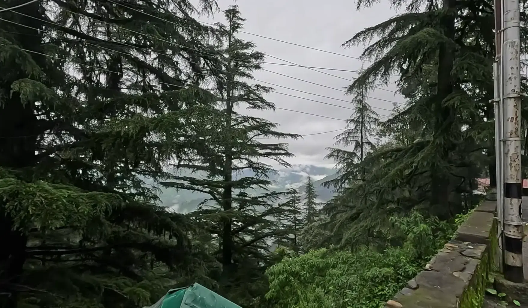 Quiet hillside road and mountain scenery in Landour, Mussoorie