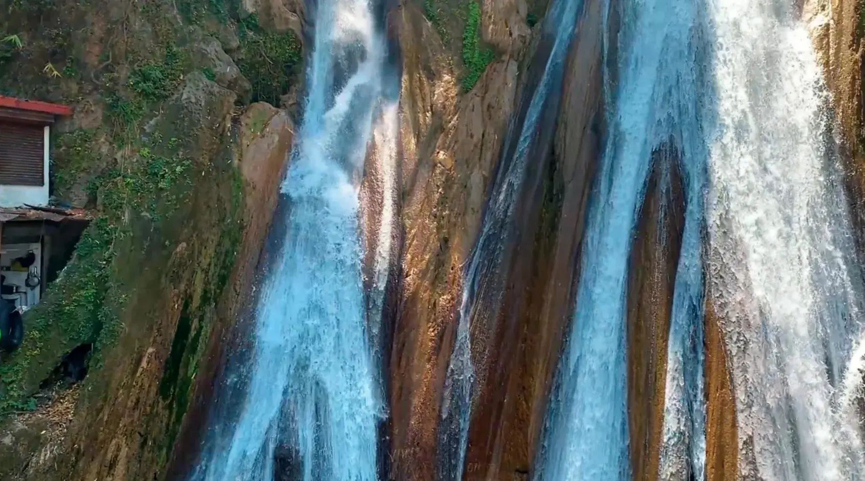 Kempty Falls cascading through the green hills near Mussoorie