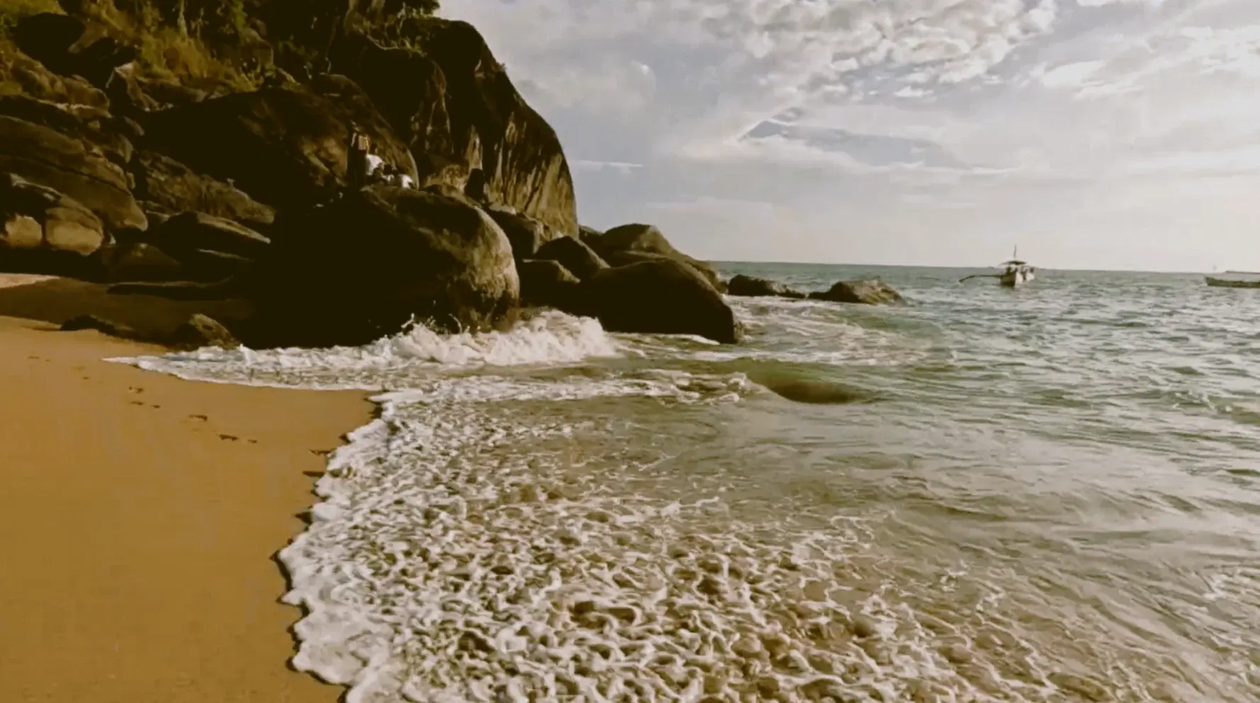 Small forest-framed cove at Butterfly Beach in South Goa
