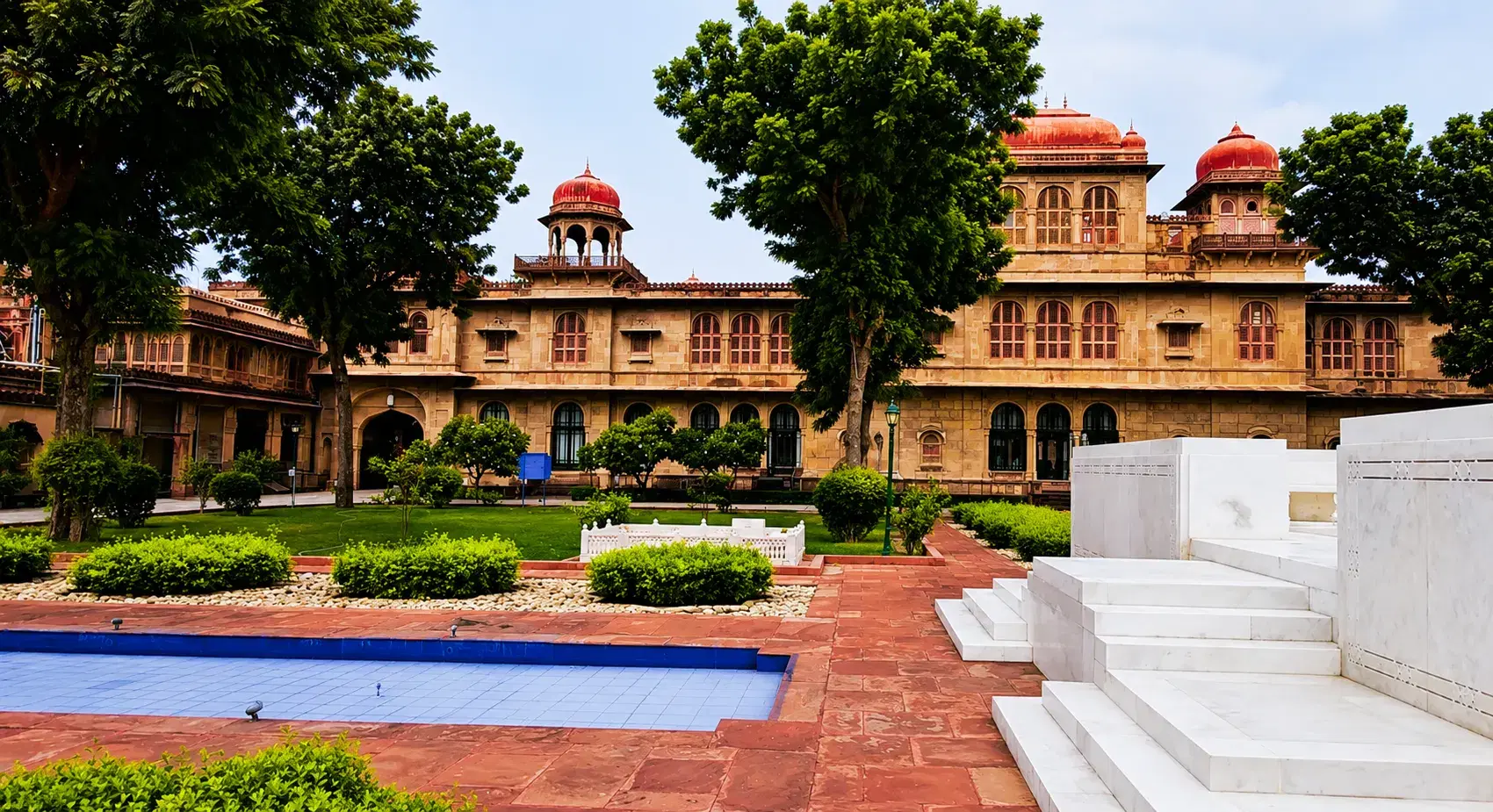 Lalgarh Palace's ornate red sandstone facade blending European and Rajputana architecture in Bikaner