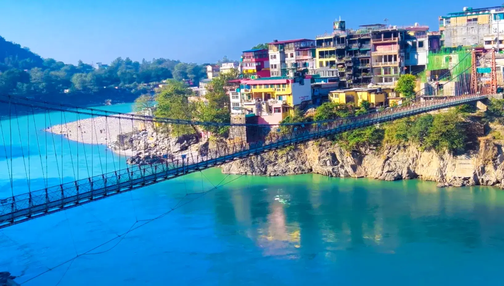Panoramic view of the Ganga River and Laxman Jhula from the top of the 13-storey Tera Manzil Temple, Rishikesh