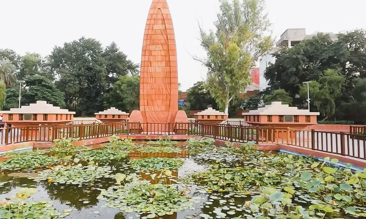 Bullet marks on the walls and the martyrs' well at Jallianwala Bagh massacre memorial, Amritsar