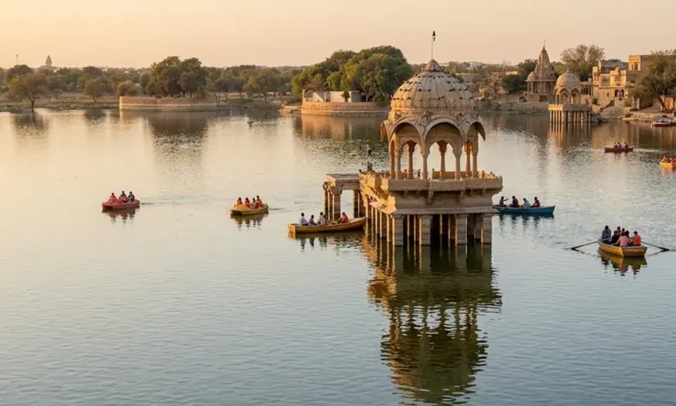 Boats, ghats, and sandstone pavilions at Gadisar Lake in Jaisalmer