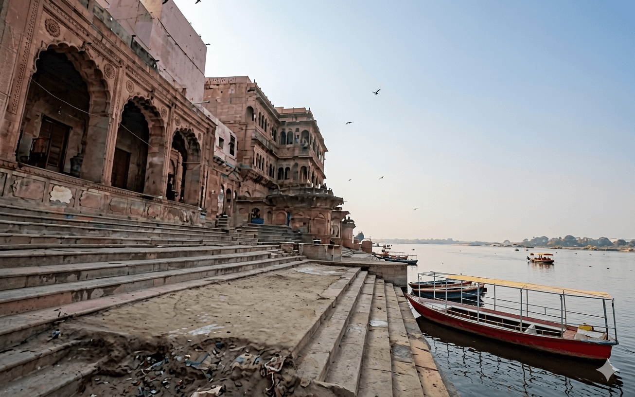 Evening Yamuna Aarti with diyas and devotees at Keshi Ghat in Vrindavan at sunset