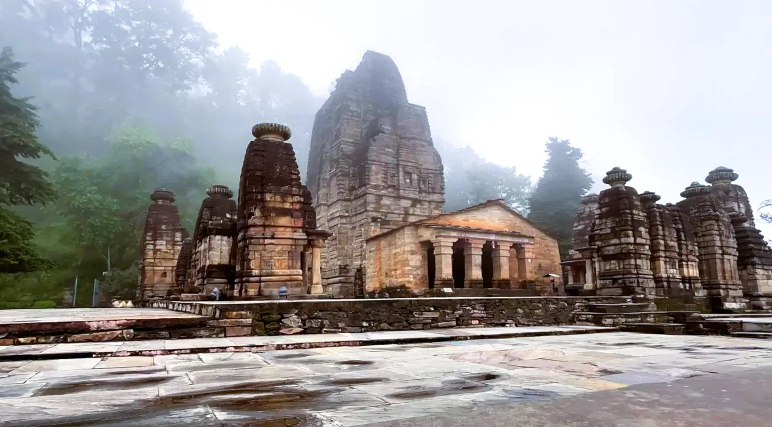 Stone shrines inside the historic Katarmal Sun Temple complex near Almora