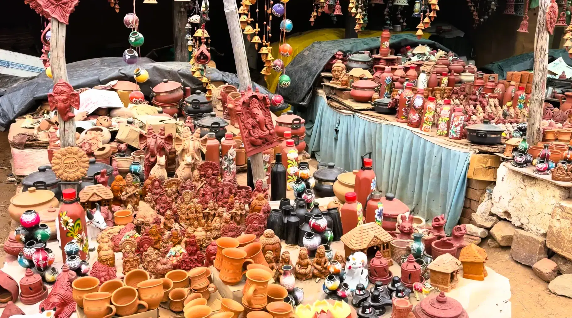 Traditional clay art displayed at Shilpgram in Udaipur