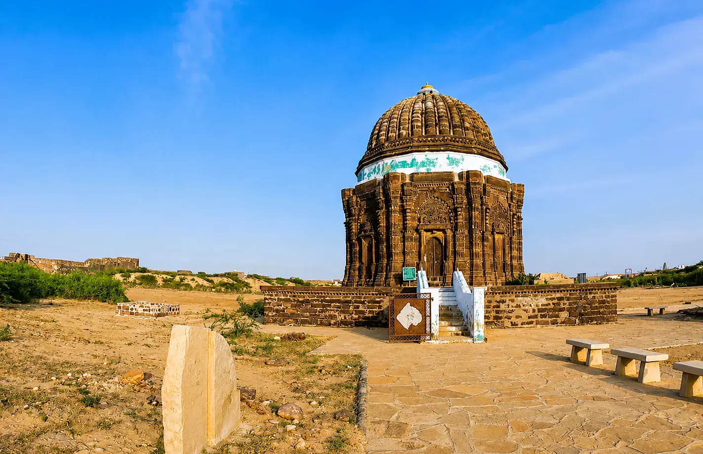 Carved domed mausoleum inside the fortified town of Lakhpat in Kutch